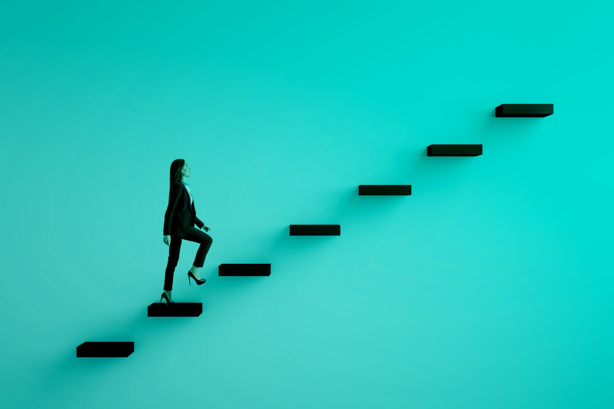 photo of woman climbing steps against teal wall