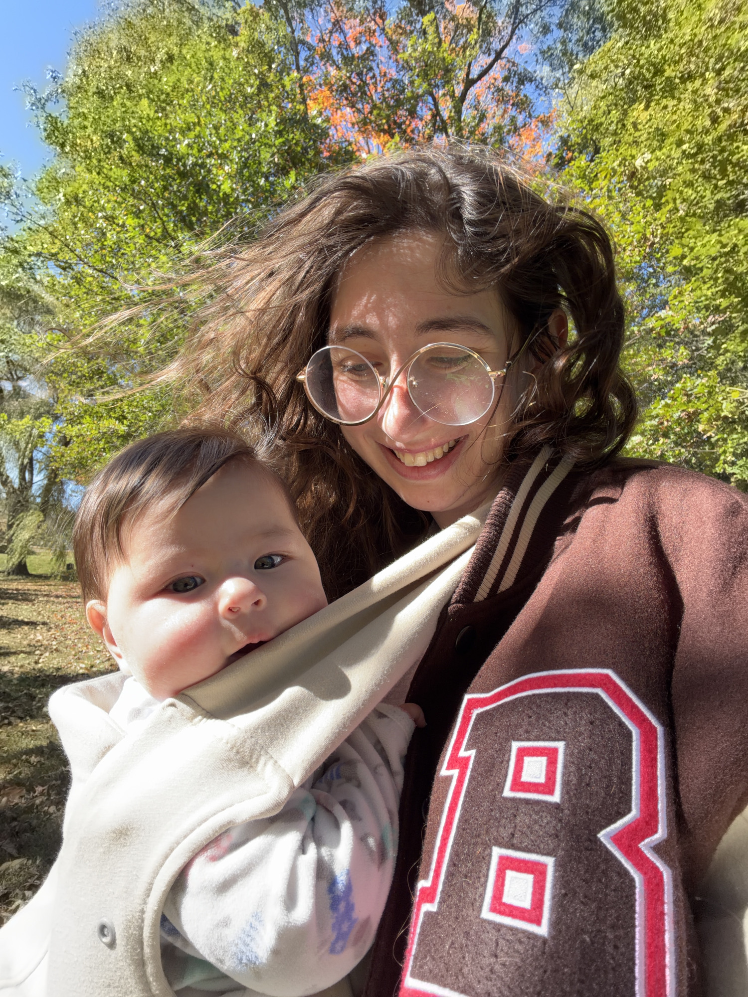 Shulamith Acevedo holding her daughter 