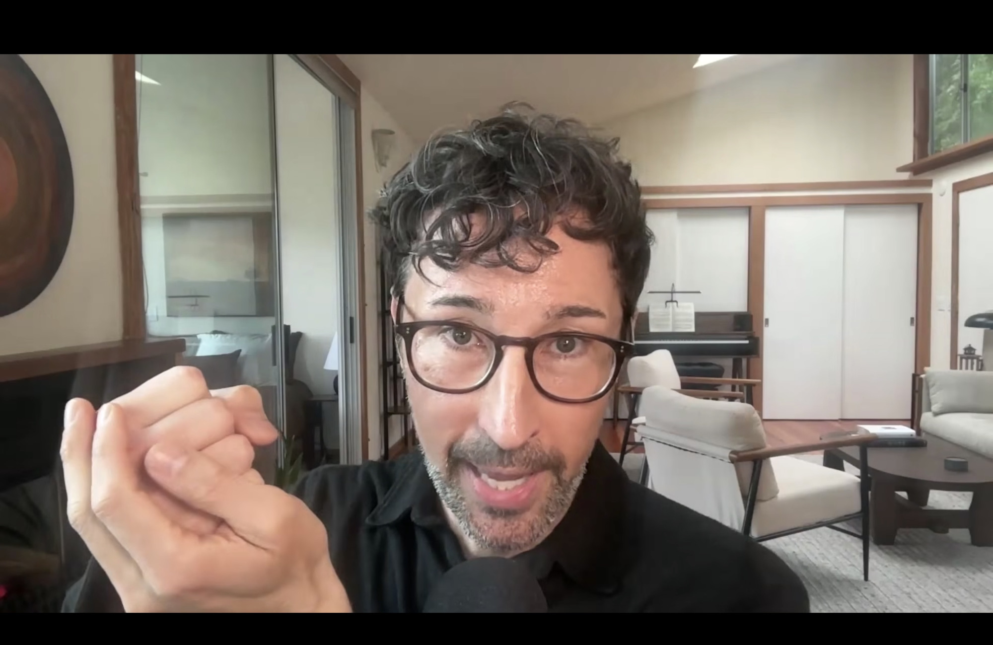 David Treleaven on zoom doing hand practice