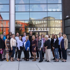 group of people standing in front of building