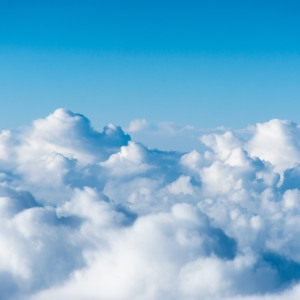 image of the tops of clouds against a blue sky 