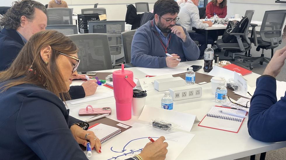 students work on a project at their desk