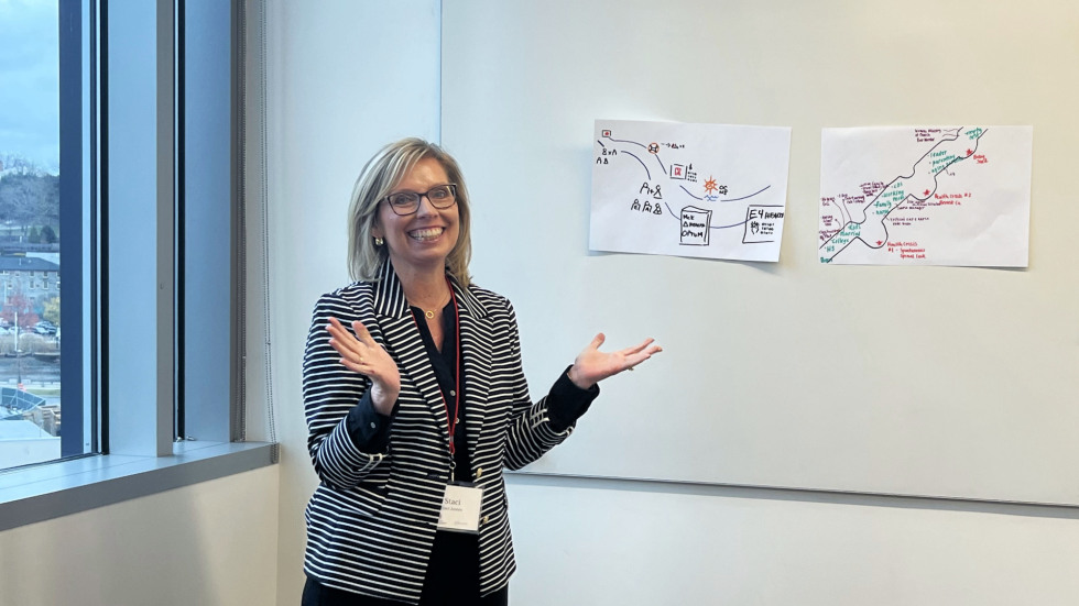 female student explain her river of life depiction